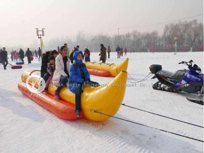 Inflatable blower sled for winter